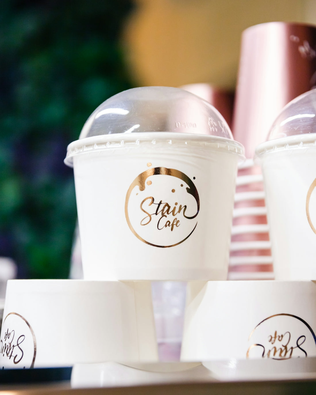 two cups of coffee sitting on top of a table